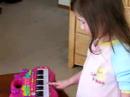 Isabel Playing The Piano