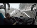 Bus drive in the Alps, snow season,  4K