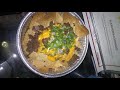 nachos with cilantro and red onion