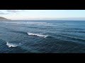 Backyard of our spot on Oahu. Surfers and sunsets with the drone.
