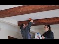 DIY Distressed Faux Beams Ceiling Transformation