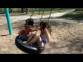 girls on the tire swing