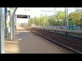 Электровоз ЭП2К с пассажирским поездом проезжает платформу Бахчиванджи в сторону Монино  04.05.2024