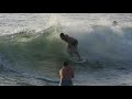 Professionals Try to Skimboard Across Shallow Sandbar