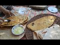 Baking greasy bread for breakfast on campfire