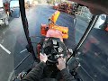 Checking over a snowblower on a Kubota LX4020