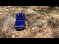 Trx 4 Sport out on the Roots Rocks Grass and Dirt