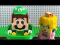 Lego Mario enters the Nintendo Switch to save Green Yoshi! Peach, Luigi & Toadette help! #legomario