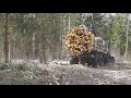 Belarus Mtz 1221,2 forestry tractor with large homemade trailer logging in winter forest