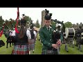 Heights of Dargai by Massed Pipes and Drums on the march at 2023 Gordon Castle Highland Games