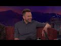 Joel McHale Flexed For The Paparazzi | CONAN on TBS