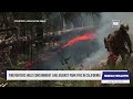 Crews battle wildfires across the US West and fight to hold containment lines