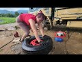 Genius girl repairs and restores a car.