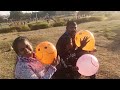 balloon blowing in park,
