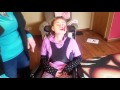 Strapping Bella into wheelchair without TLSO