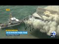 Firefighters battling massive fire on historic pier in California