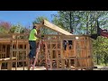 Stick built rafter roof with rough cut green lumber. (The Mad Neighbor camp build part 8)