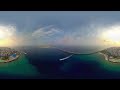 Male, Maldives. Scenic flight over the city. Relaxing aerial 360 video in 8K.