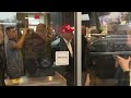 VIDEO | Former President Trump buys food for East Palestine firefighters, everyone in McDonald's