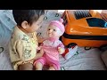 Kids playing with doll- Feeding the doll