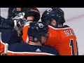 Edmonton Oilers fans cheer after clinching their playoff spot