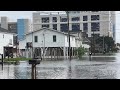 08-06-2024 North Myrtle Beach, SC - Roads Flooded - People Playing in Flood Waters