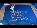 Oddly satisfying embroidery machine stitching out a dragon