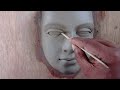 making a female face with water based clay//how to make a face with clay... sculpting face in clay