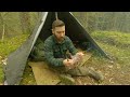 Solo Bushcraft Camping in Rain – Polish Lavvu, Bow Drill Fire, Carving Bench, Kuksa, Chaga, Quail