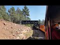 HIGH UP SHOT of the Durango & Silverton Train Passing By An Abandoned Mine in Silverton, Colorado!
