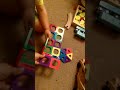 Ryo playing with magnetic shapes