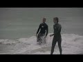 Kid Tries to Catch Giant Waves on a Skimboard