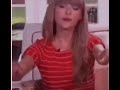 Taylor Swift waving while Charlie and the chocolate factory song plays