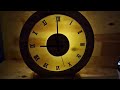 Wall Clock of Wood and Epoxy with LED. Solar Eclipse