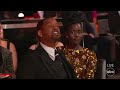 Will Smith slaps Chris Rock on stage after he jokes about his wife at 2022 Oscars