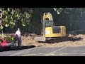 EXCAVATOR at WORK with a grapple scooper