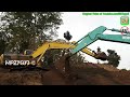 Excavators Excavating Dirt Kobelco SK200 Komatsu PC200 XCMG XE215C