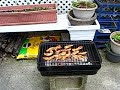 Cooking chicken tenders on my fire grill
