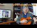 Vicar plays guitar like a banjo