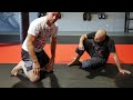 Arm In Guillotine Choke Defense from Closed Guard