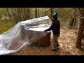 Survival Camping in a coniferous forest | The Bushcraft dugout shelter looks like a giant mushroom