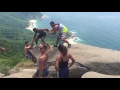 Would you take a picture dangling over this cliff? These people are