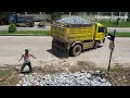 New Action Building New Road By Truck 5 TON Unloading And Bulldozer D20P Pushing Spreading Stone