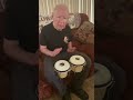 Grandad playing bongos
