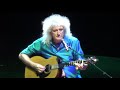 Brian May is playing  Something  (Beatles song)