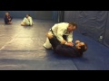 Flower sweep with arm bar transition