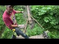 Starting the Wood Shed - Setting posts and laying foundation logs