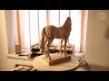 I carved a horse from wood.Horse sculpture. Woodcarving