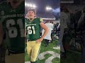 Storming the field after beating Boise State