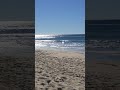 small wave on a beautiful day on the beach